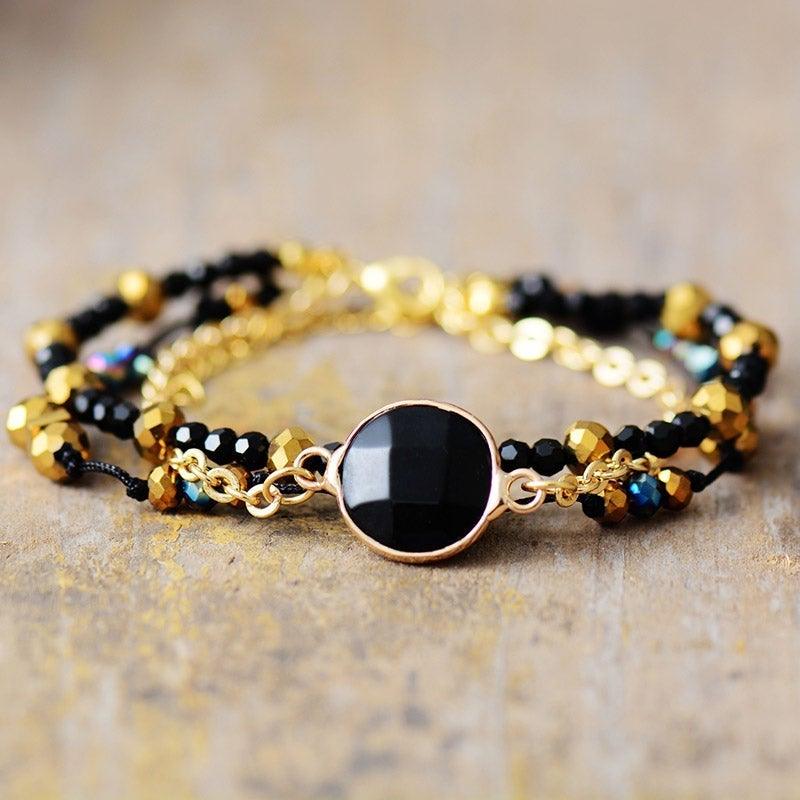 Armbånd "Positiv Aura" med forgyldte perler af sort onyx